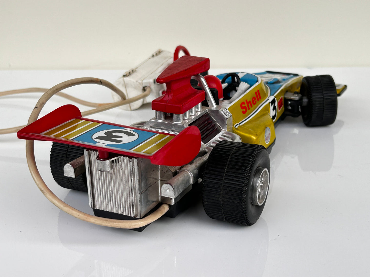 Lotus F1 hojalata con mando · Ideal España 70s