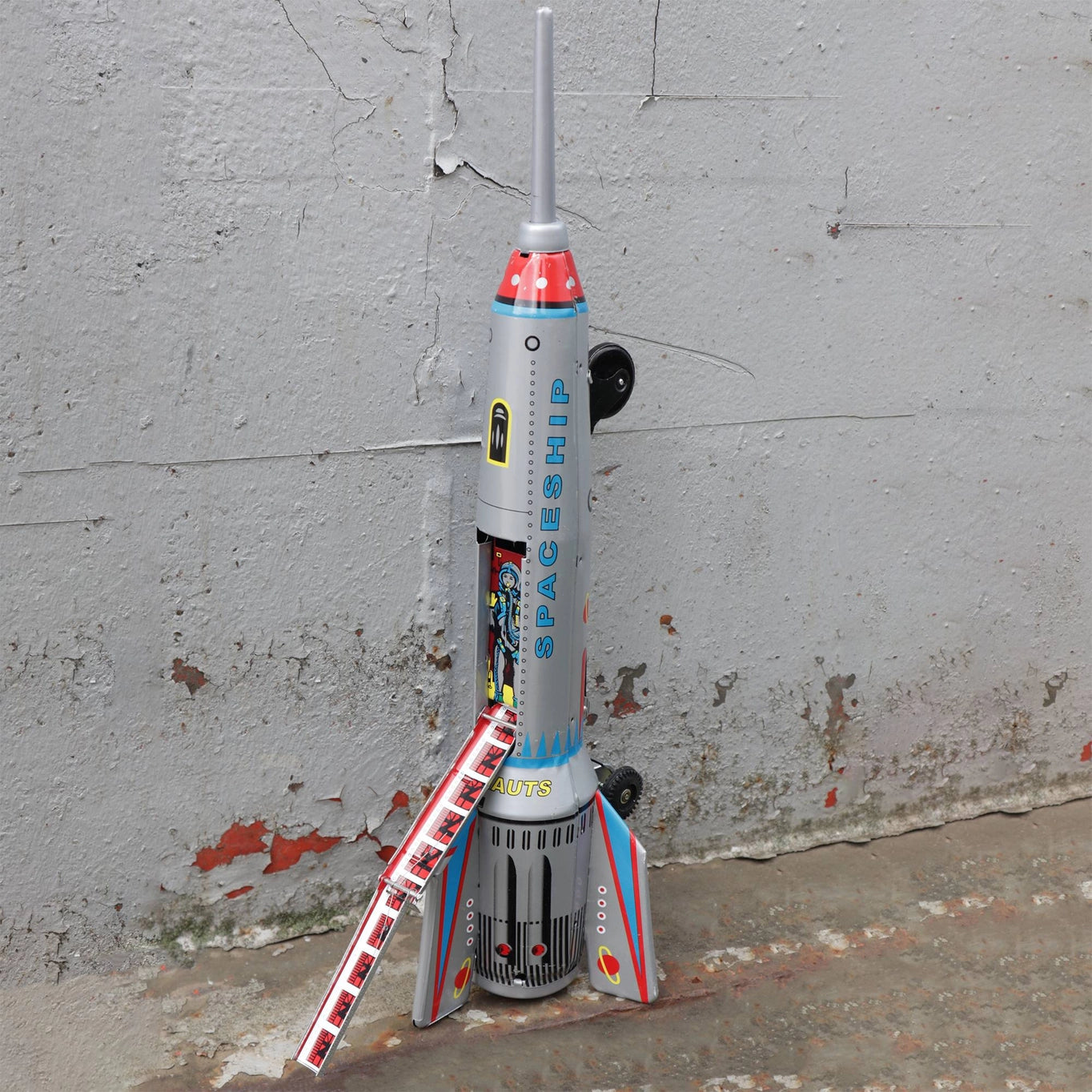Cohete Skyexpress Robot de hojalata