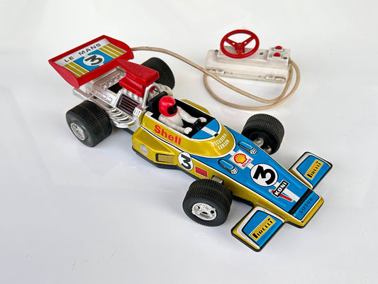 Coche carrera Lotus F1 hojalata con mando remoto a cable. Gran tamao, 40cm Marca Ideal, España años 70s.  Lotus escudería Sanson