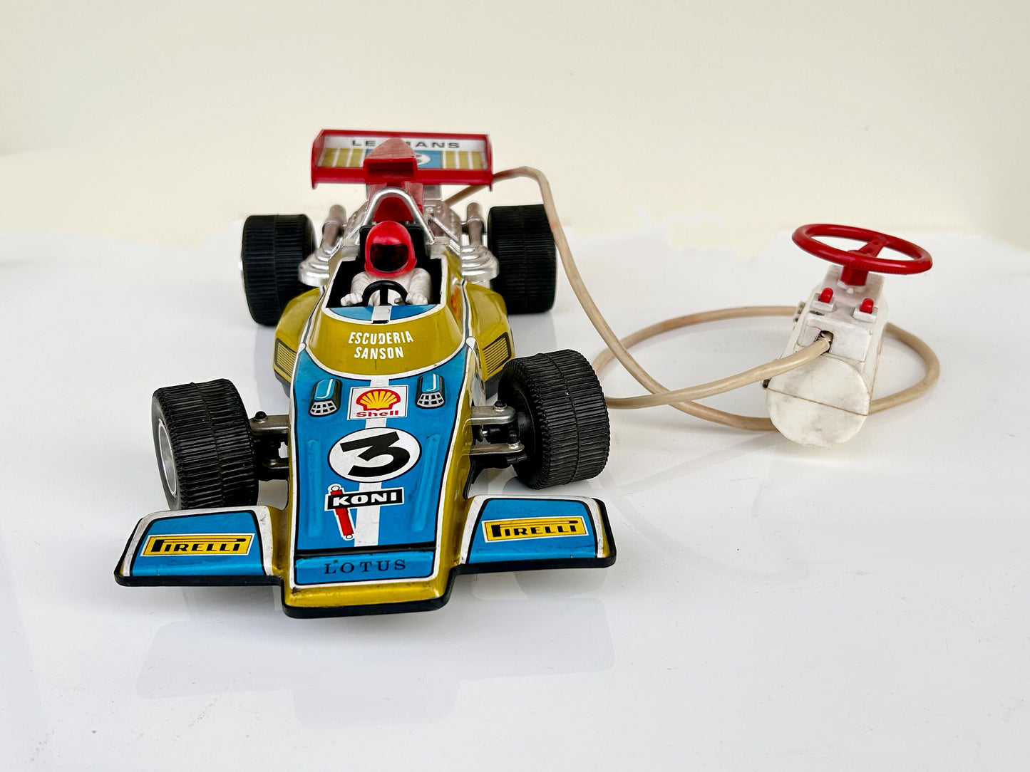 Lotus F1 hojalata con mando · Ideal España 70s