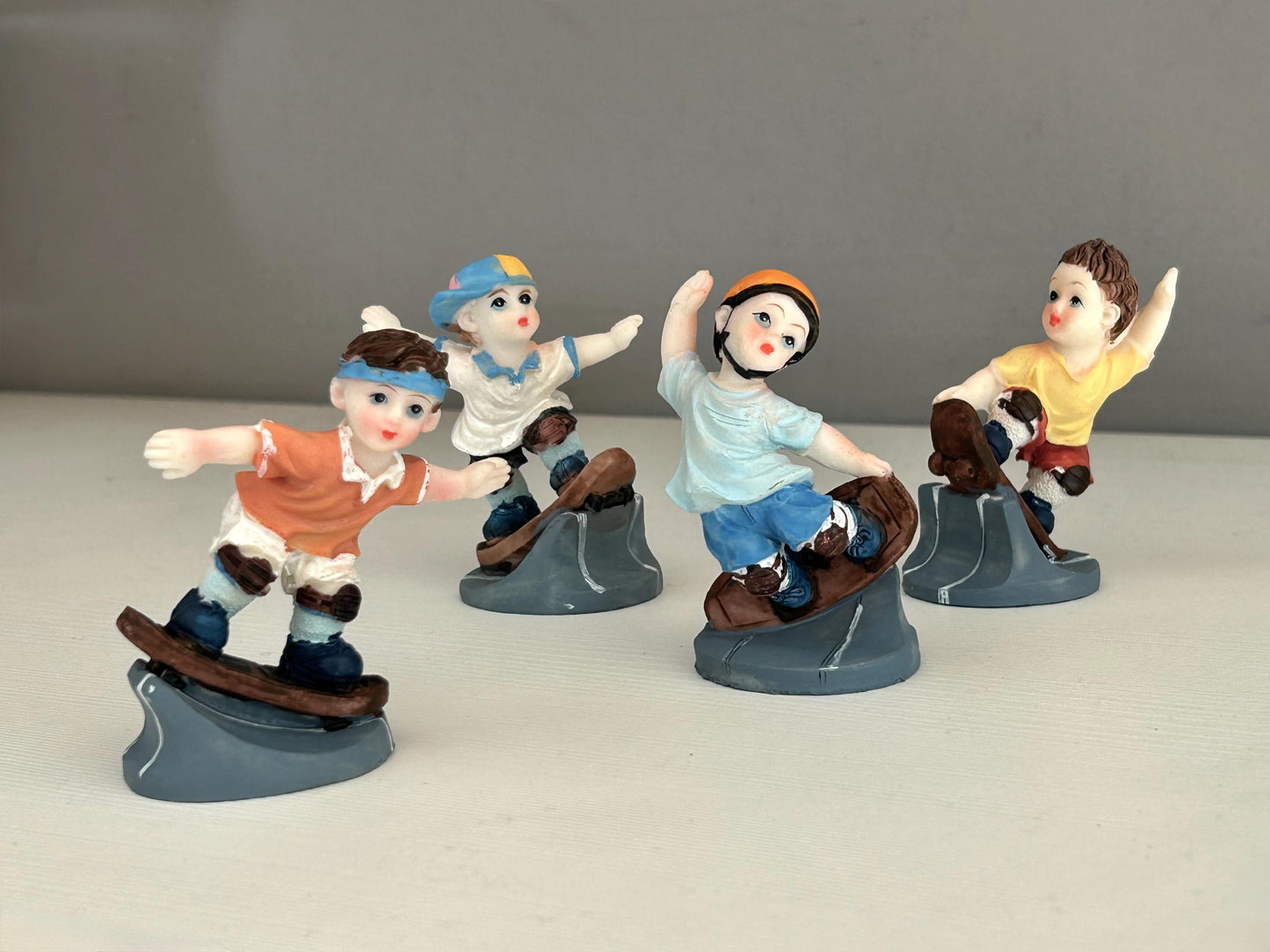 Lote figuras niños skaters, decáda del 80