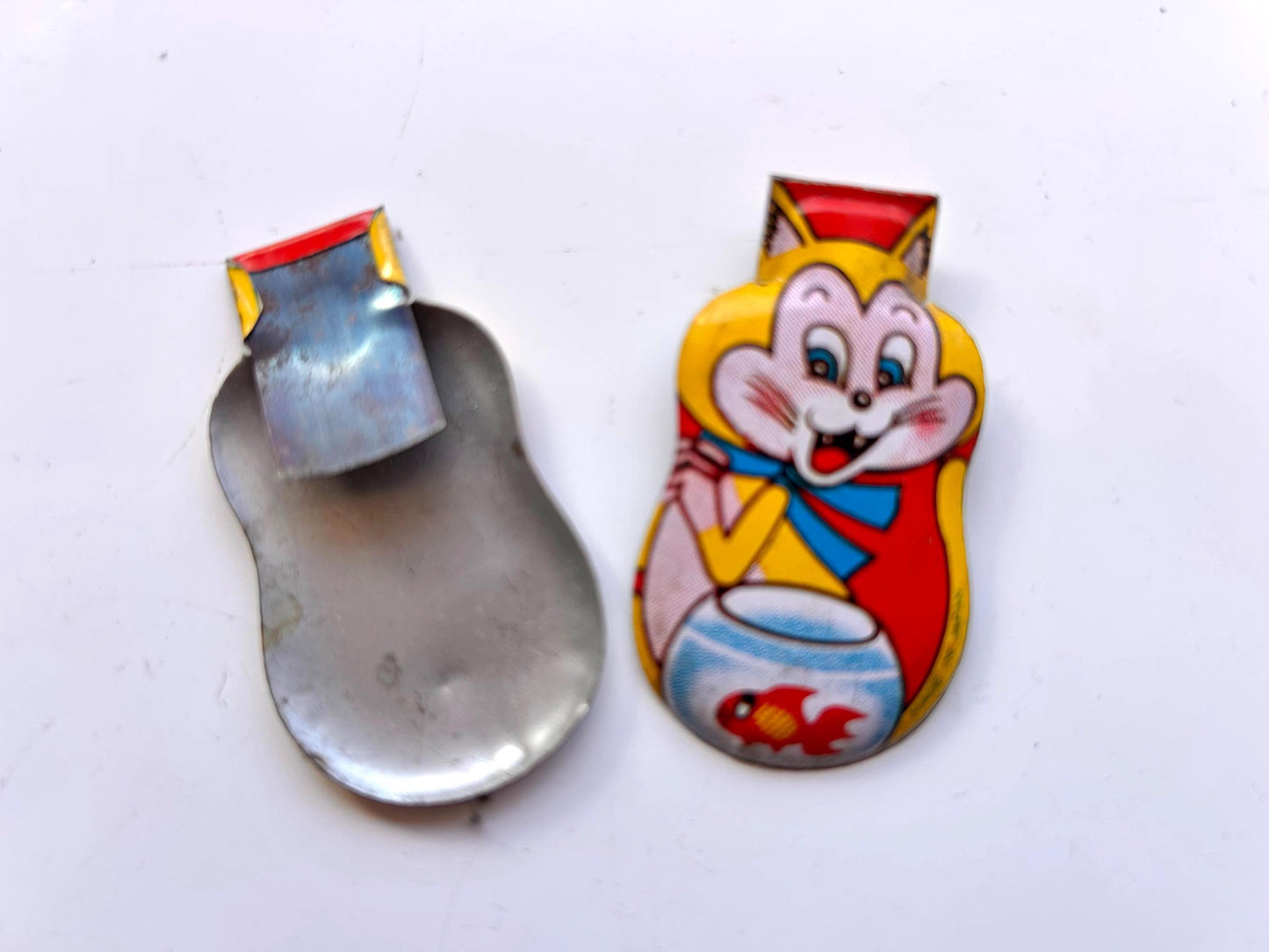Clickers metálicos vintage · Made in Japan