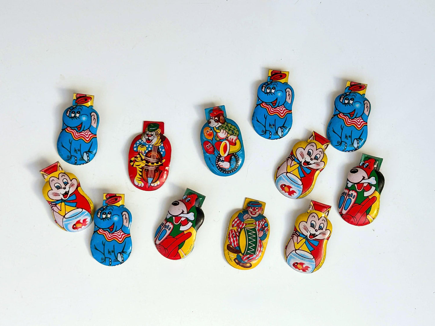 Clickers metálicos vintage · Made in Japan
