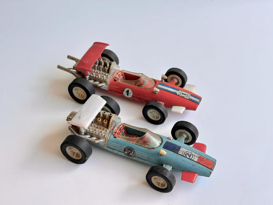Coches Fórmula 1 Vintage SAXO Argentina (años 60) – Pareja de monoplazas 1 y 2 – Juguetes de chapa litografiada