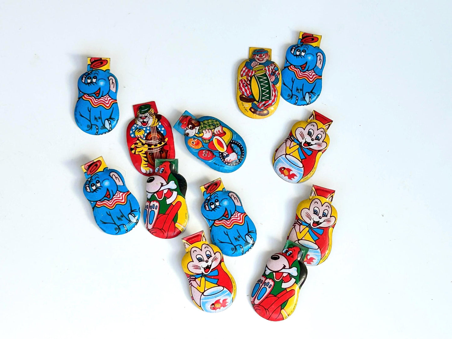 Clickers metálicos vintage · Made in Japan