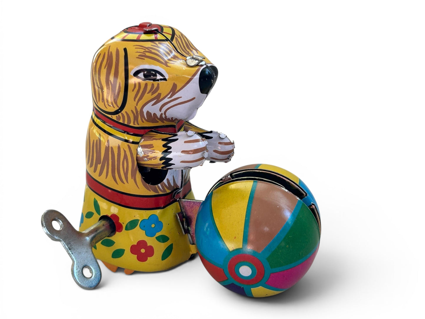 Perrito con pelota · Hojalata a cuerda