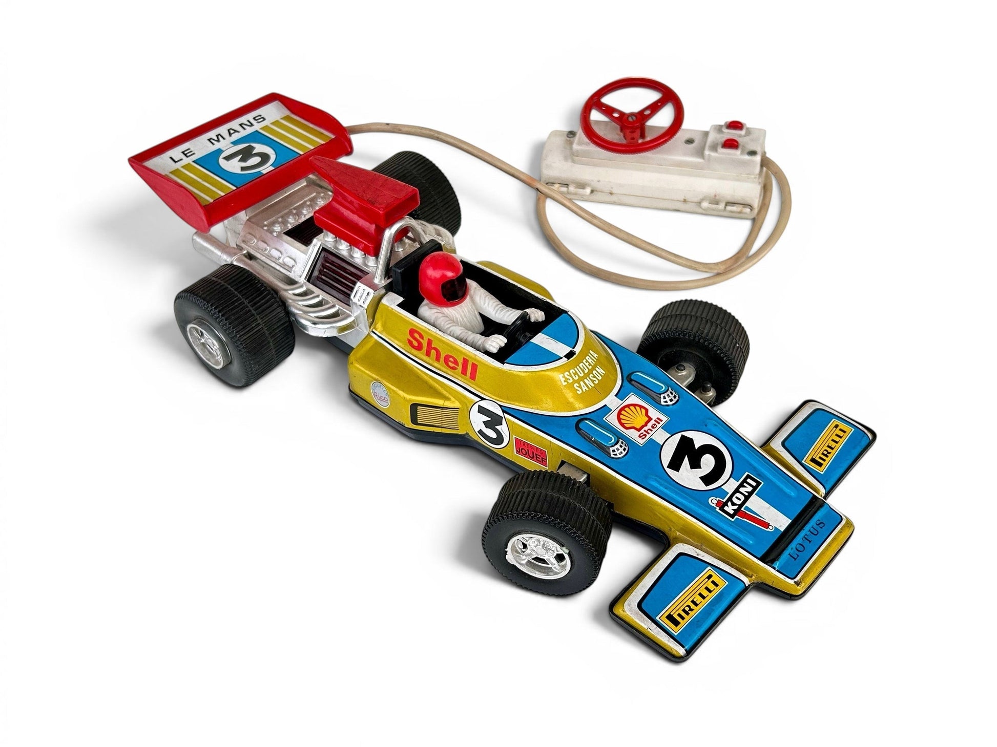 Coche carrera Lotus F1 hojalata con mando remoto a cable. Gran tamao, 40cm Marca Ideal, España años 70s.  Lotus escudería Sanson