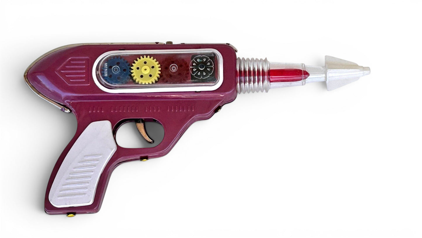 Pistola espacial hojalata · Fricción años 70s