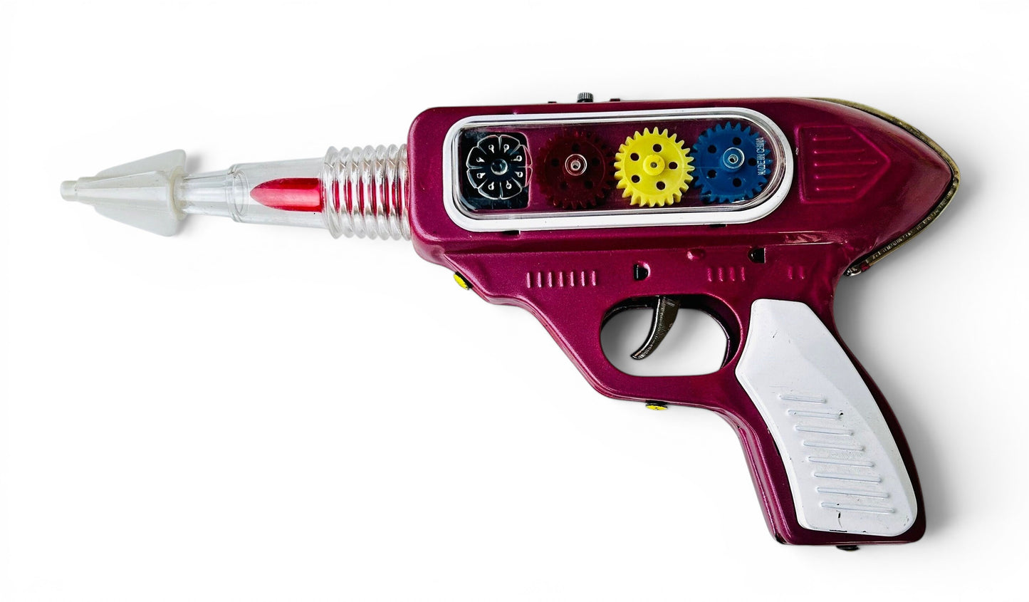 Pistola espacial hojalata · Fricción años 70s
