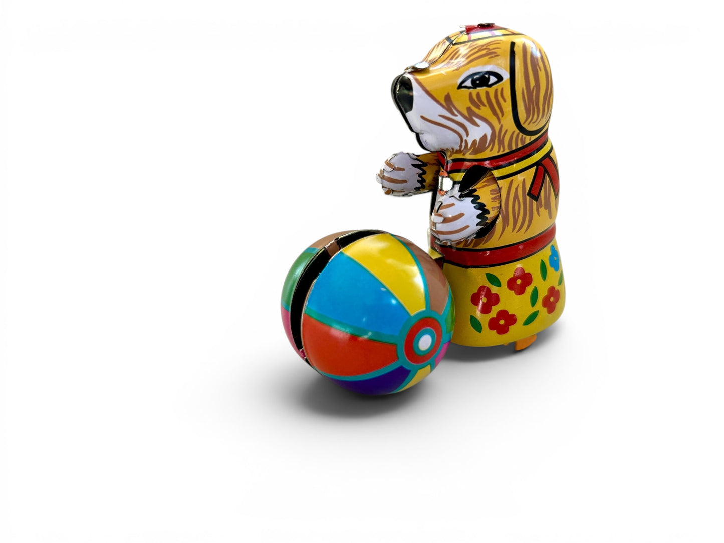Perrito con pelota · Hojalata a cuerda