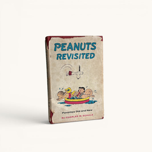 Libro vintage “Peanuts Revisited” (1959) – Charles M. Schulz, Snoopy y Charlie Brown, edición original con sobrecubierta