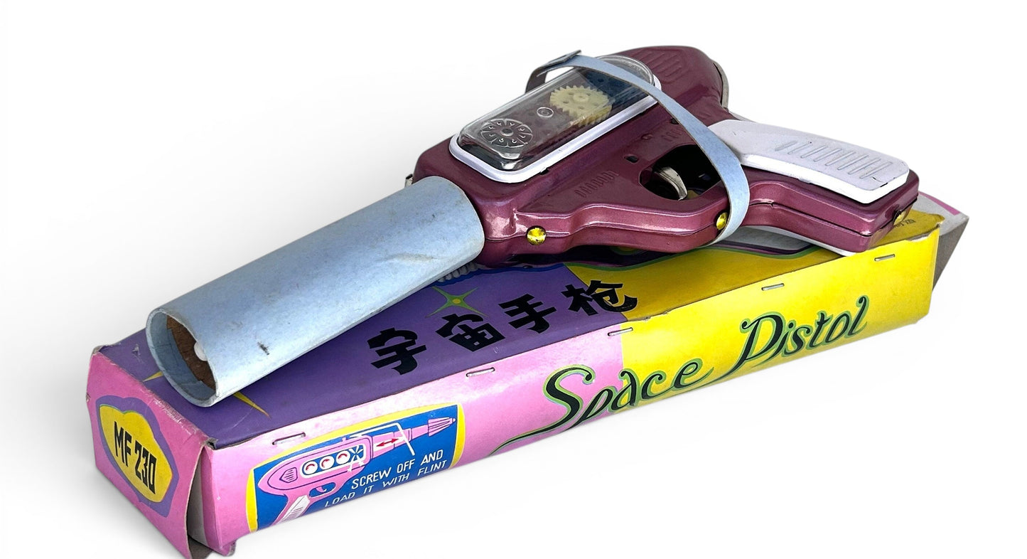 Pistola espacial hojalata · Fricción años 70s