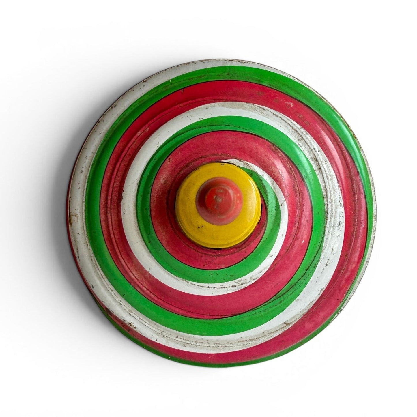 Trompo vintage de Retrópica Tienda, juguete clásico de metal y madera con diseño de espiral en rojo, verde y blanco.