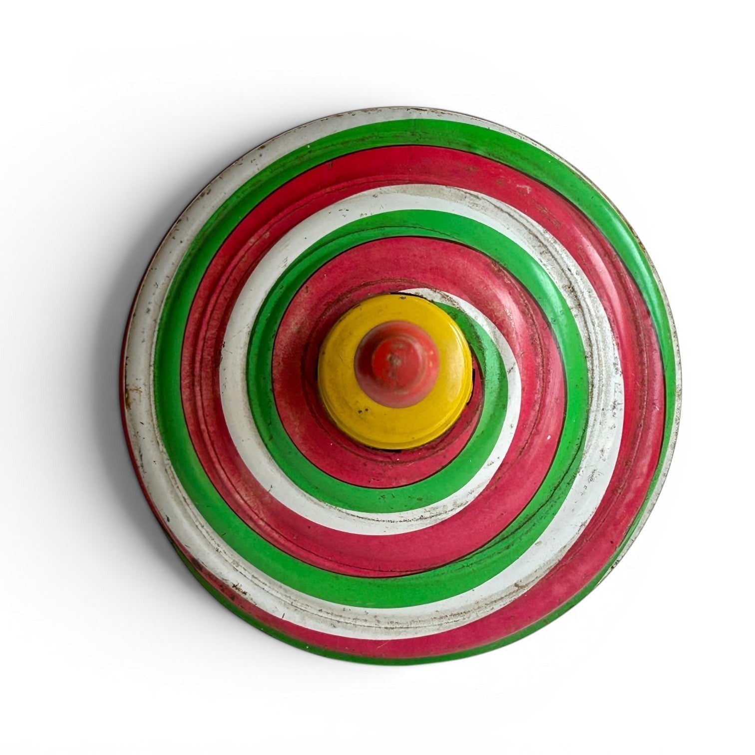 Trompo vintage de Retrópica Tienda, juguete clásico de metal y madera con diseño de espiral en rojo, verde y blanco.