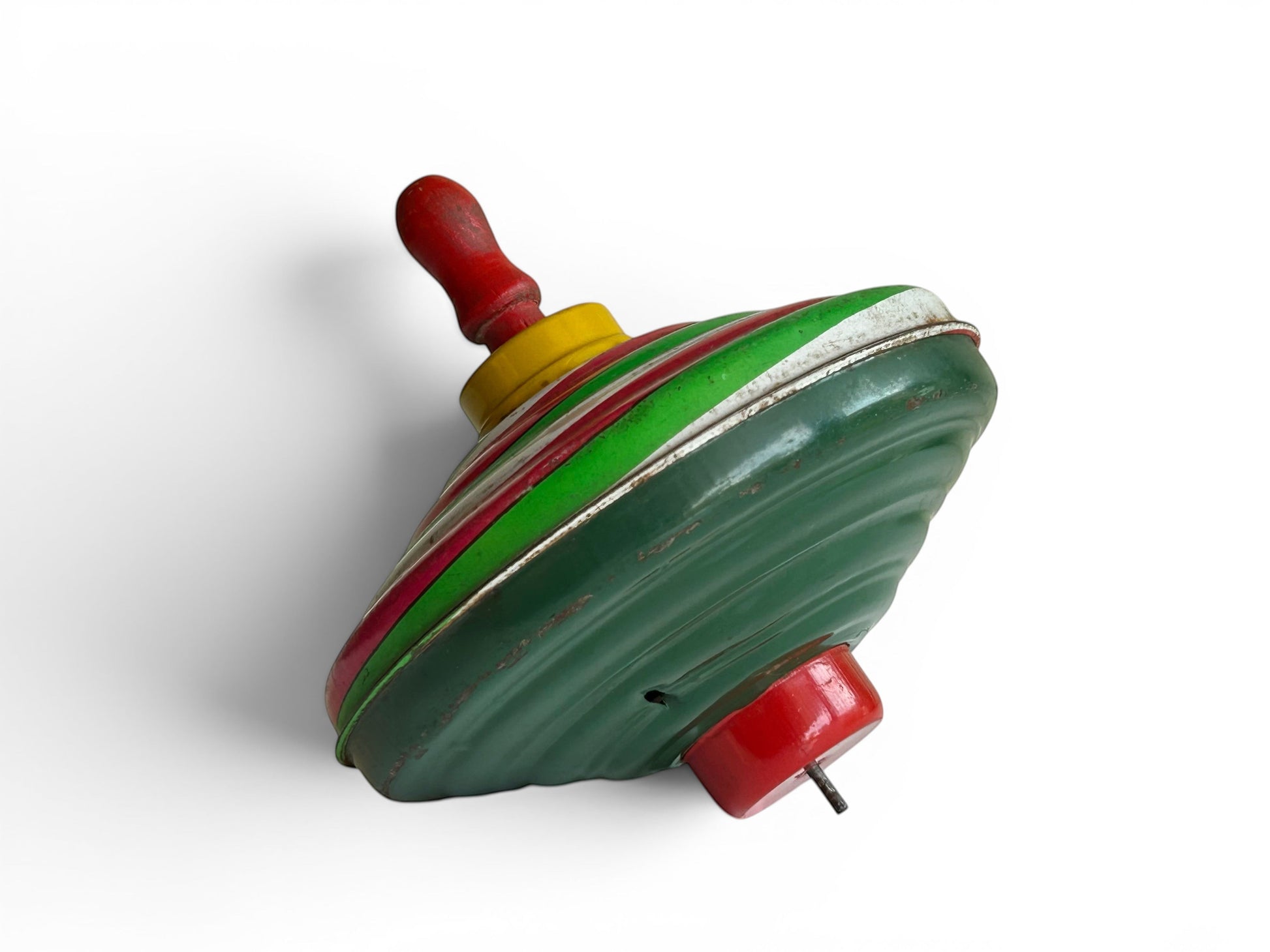 Trompo vintage de metal y madera de Retrópica Tienda, juguete clásico de los años 60 en colores rojo, verde y amarillo