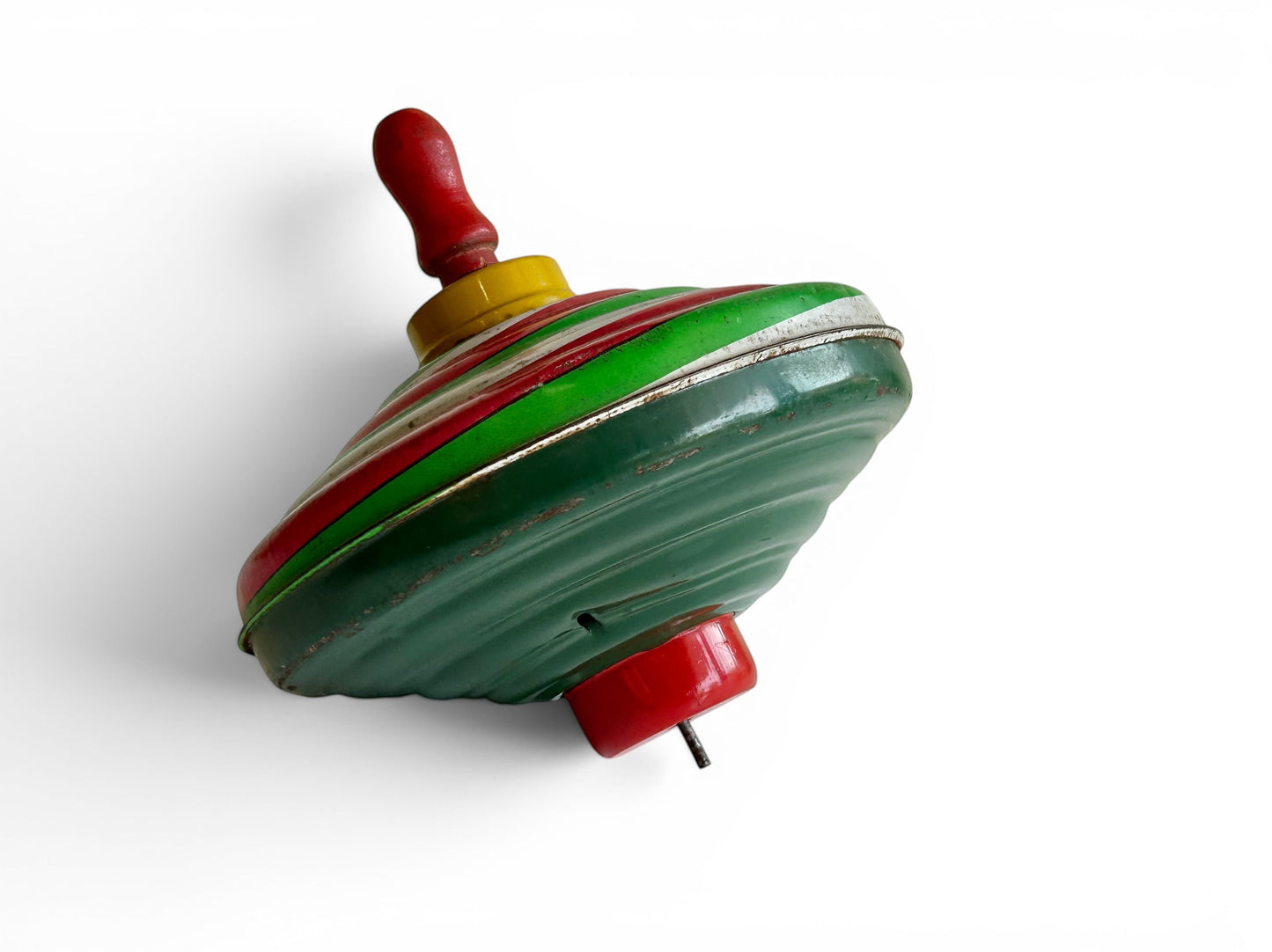 Trompo vintage de metal y madera de Retrópica Tienda, juguete clásico de los años 60 en colores rojo, verde y amarillo
